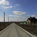 Закончено строительство третьей очереди асфальтированных дорог коттеджного поселка  «Архангельские Сады»
